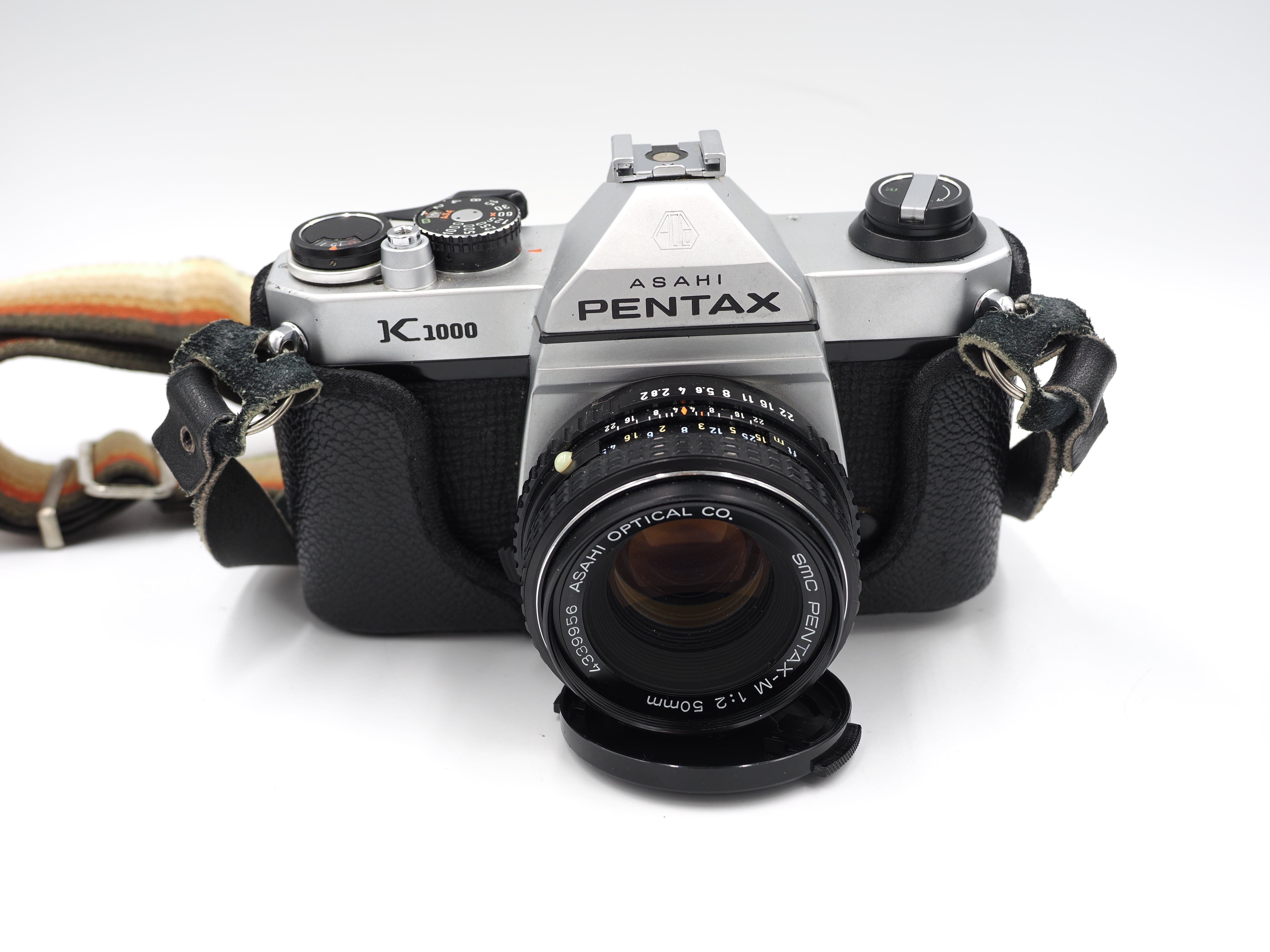 Used Pentax K1000 with 50mm f/2 lens and leather case MINT #7009