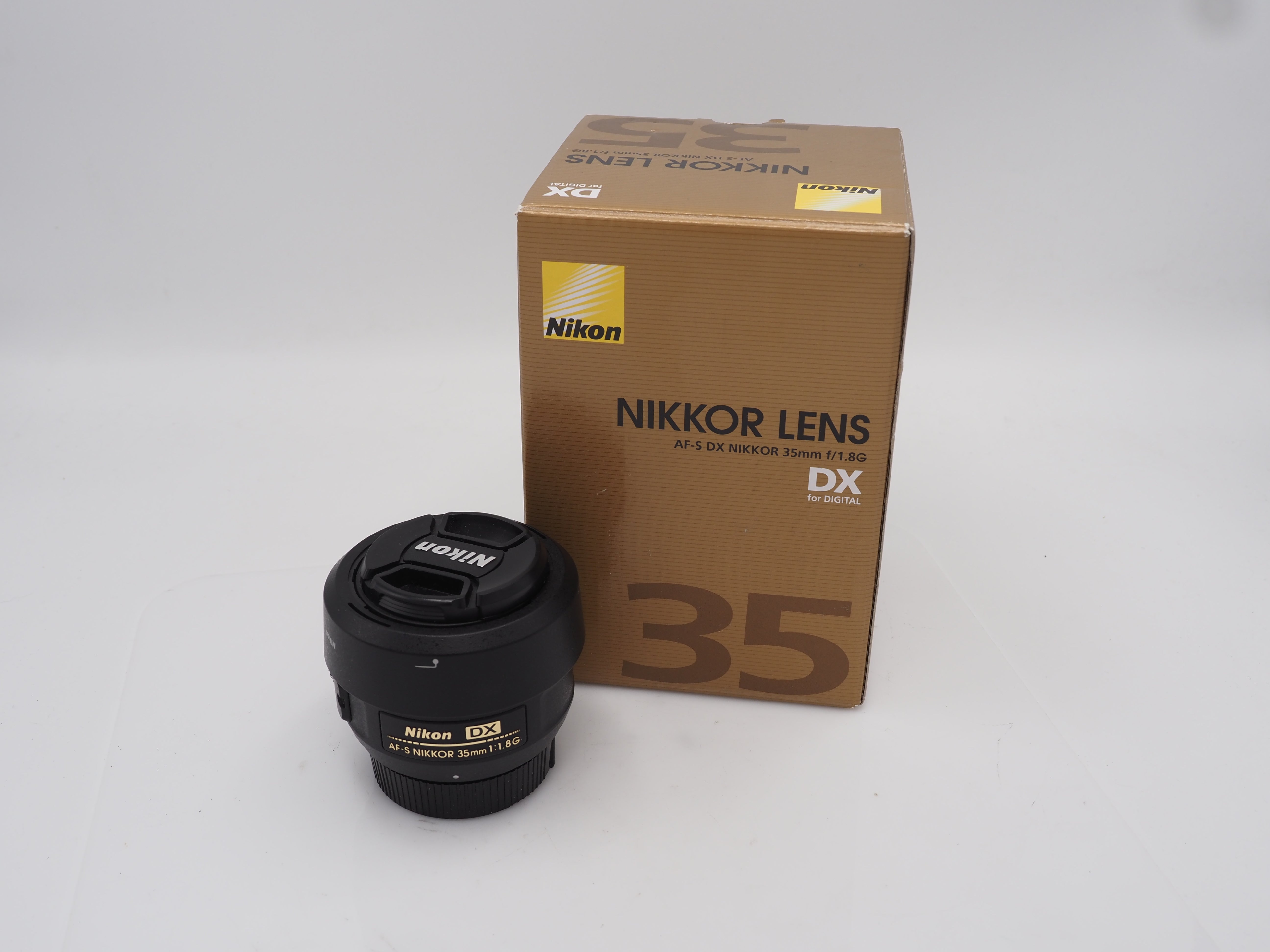 Used Nikon DX 35mm f1.8 G lens #6400