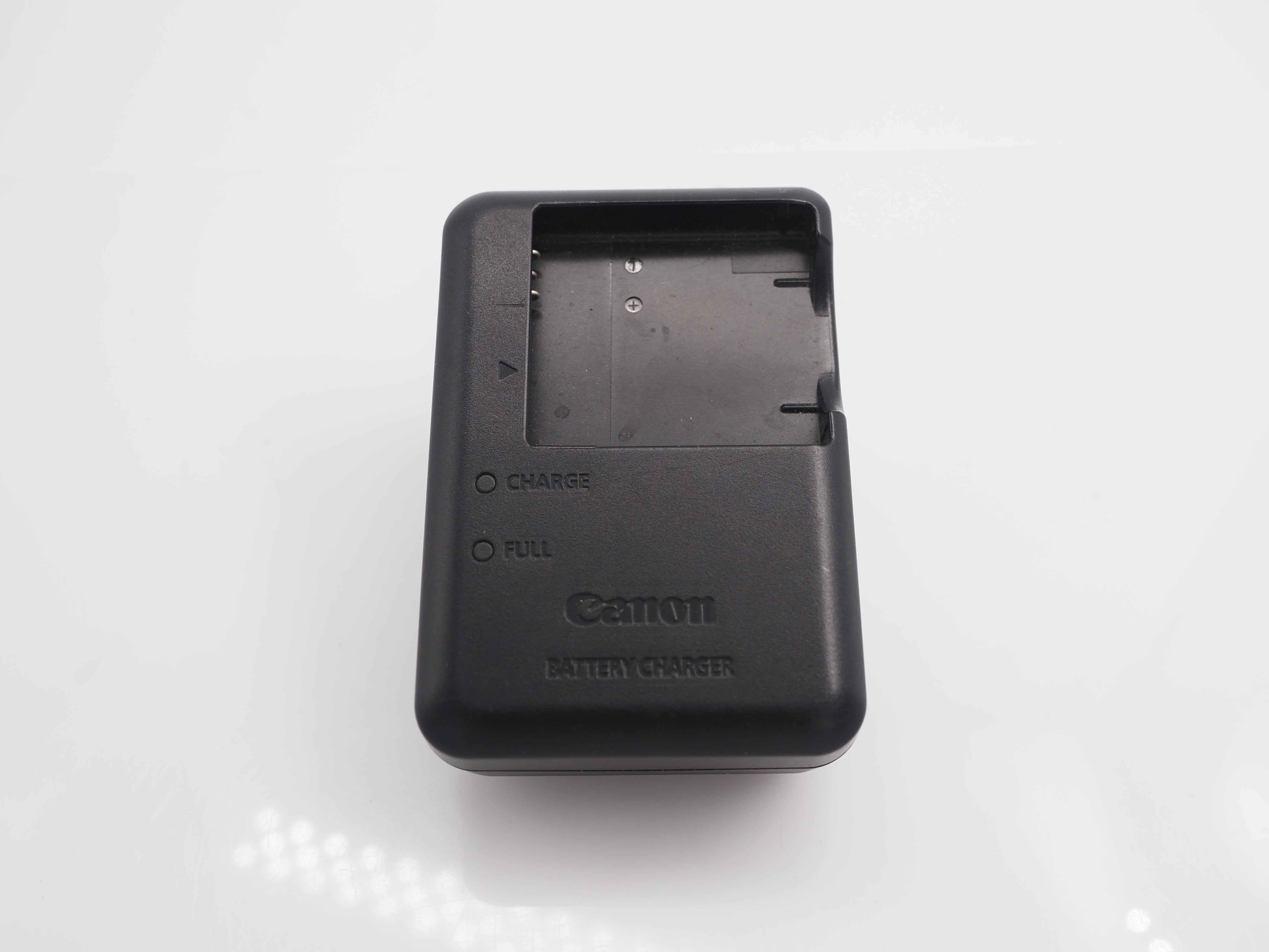 Used Canon CB-2LA battery charger # 8574us